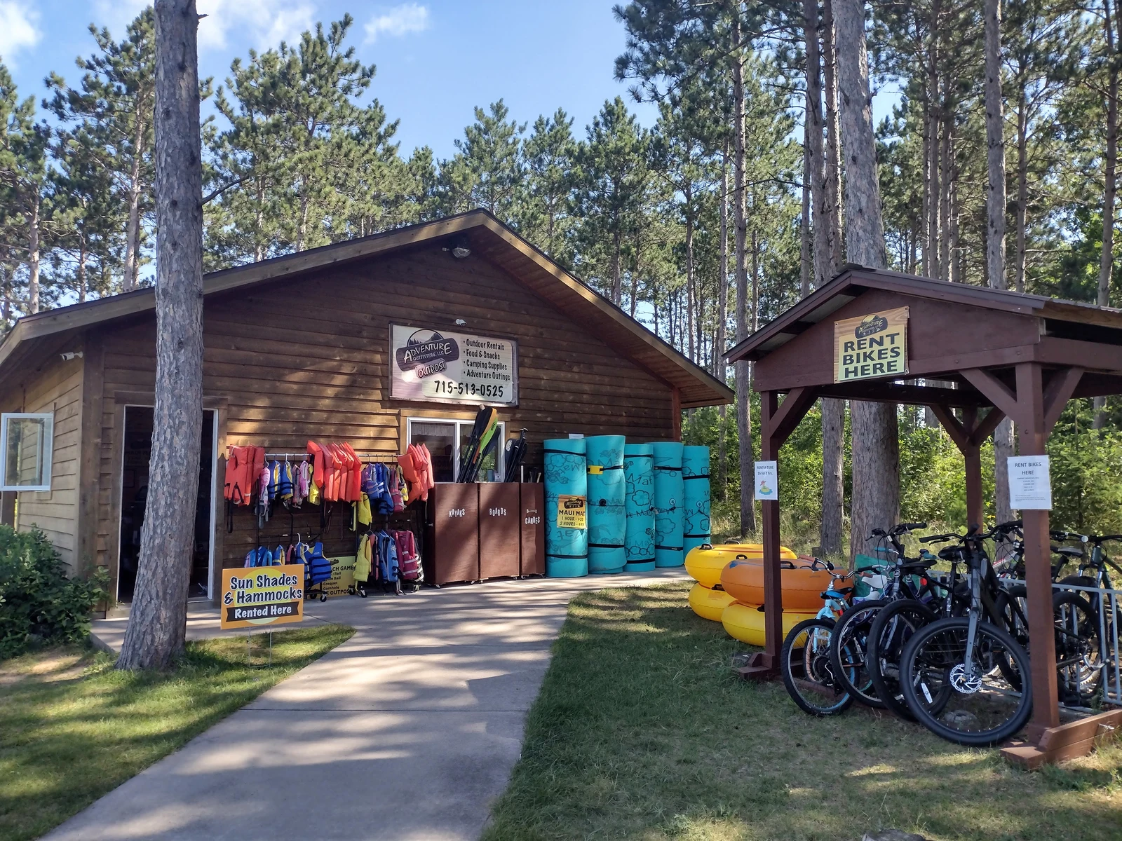 Adventure Outfitters Outpost at Hartman Creek State Park, with rental gear and bicycles outside