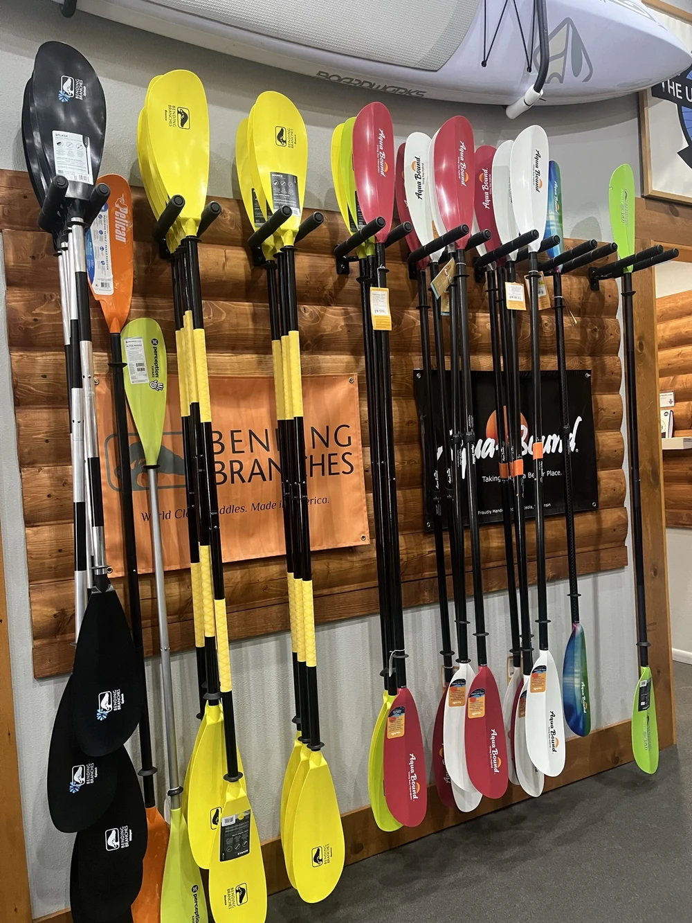 Paddles displayed inside Adventure Outfitters